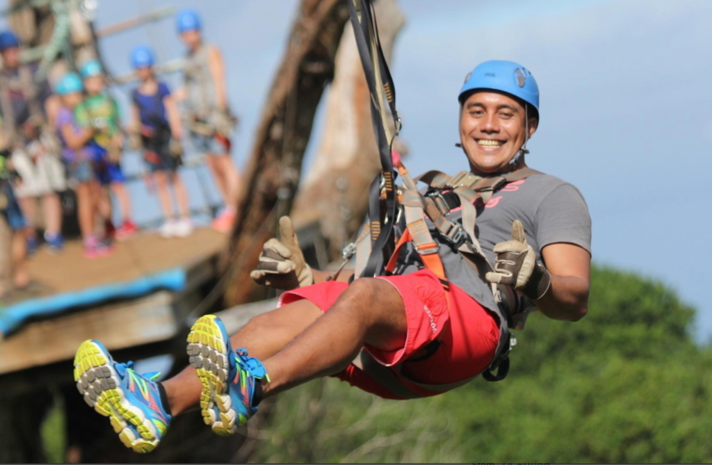Guests crossing suspension bridge at Camp Maui zipline